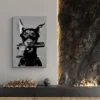 tableau chien noir et blanc salon pierre.webp