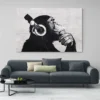 tableau singe avec casque paysage 3 2 3.webp